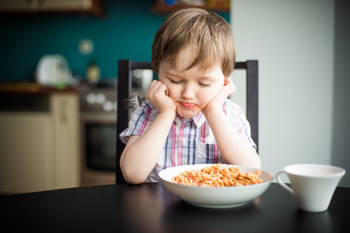 Boy refusing to eat